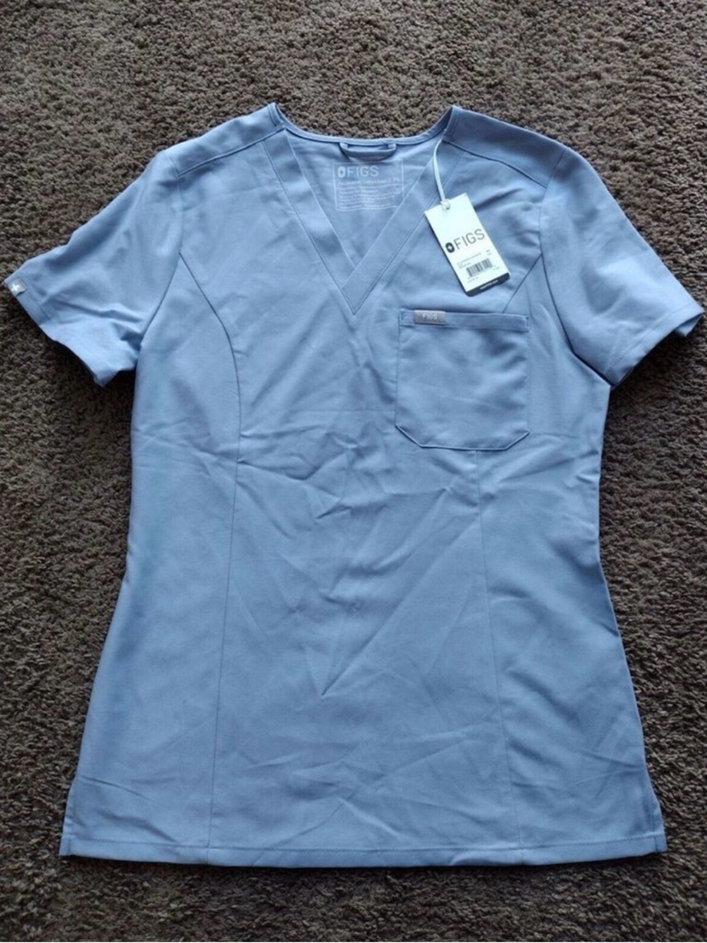 Figs Women’s Light Blue V‑Neck Scrub Top with Chest Pocket